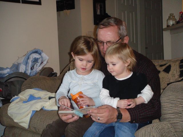 Grandpa reading to the girls