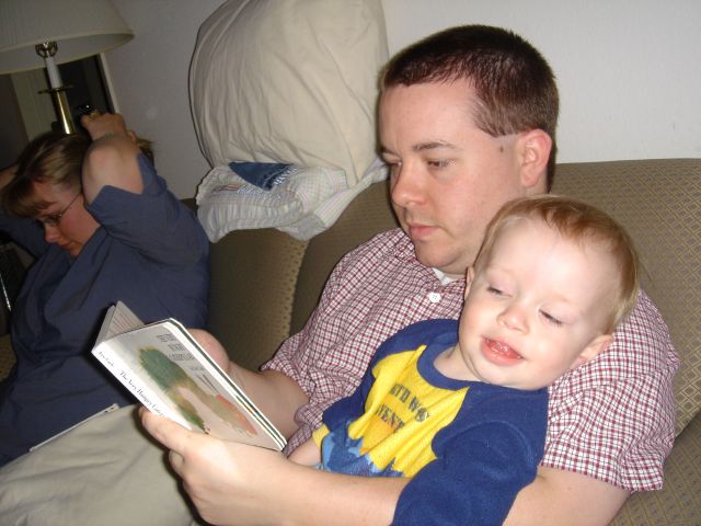 Barry reading a bed time story to Jacob